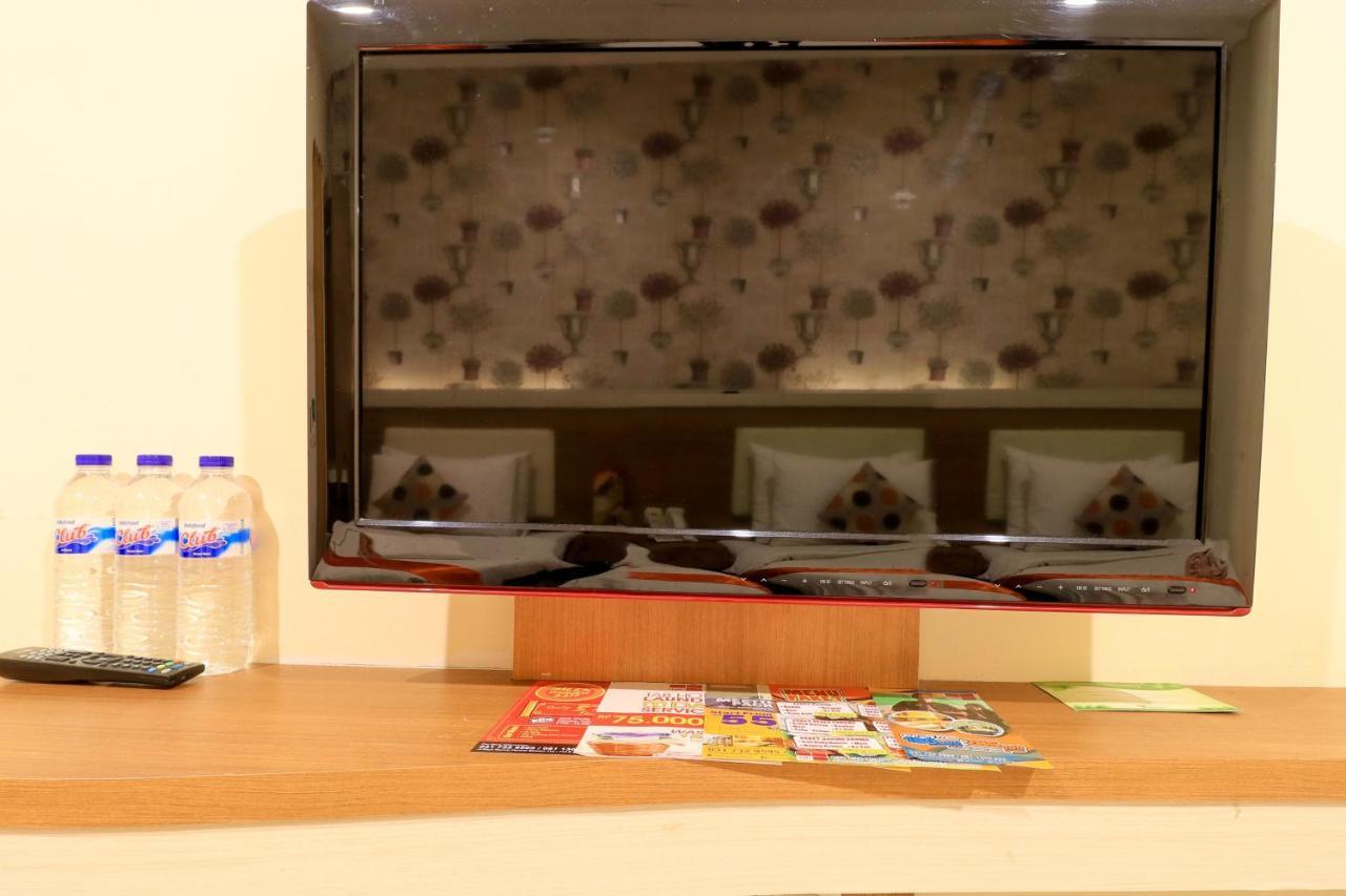 泗水标签酒店 外观 照片